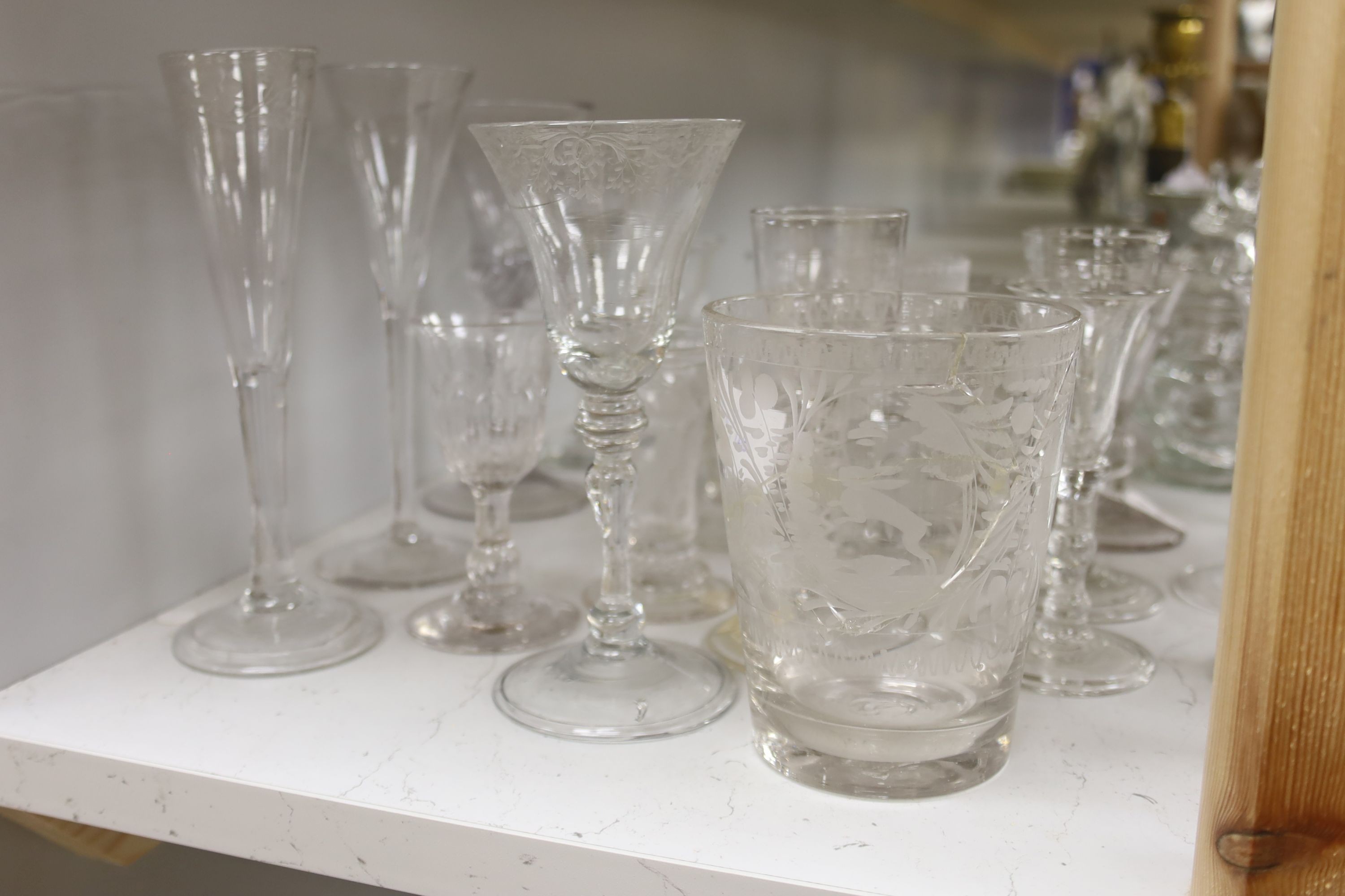 A collection of Georgian and later stem drinking glasses, ale glasses and other decorative glass wares